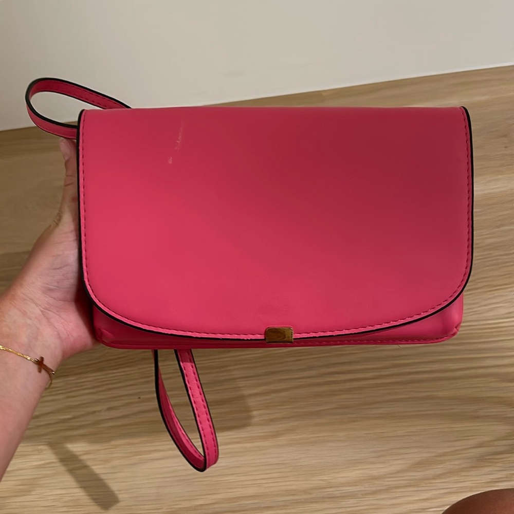 A new day pink purse really cute has lots of pockets and mirror!